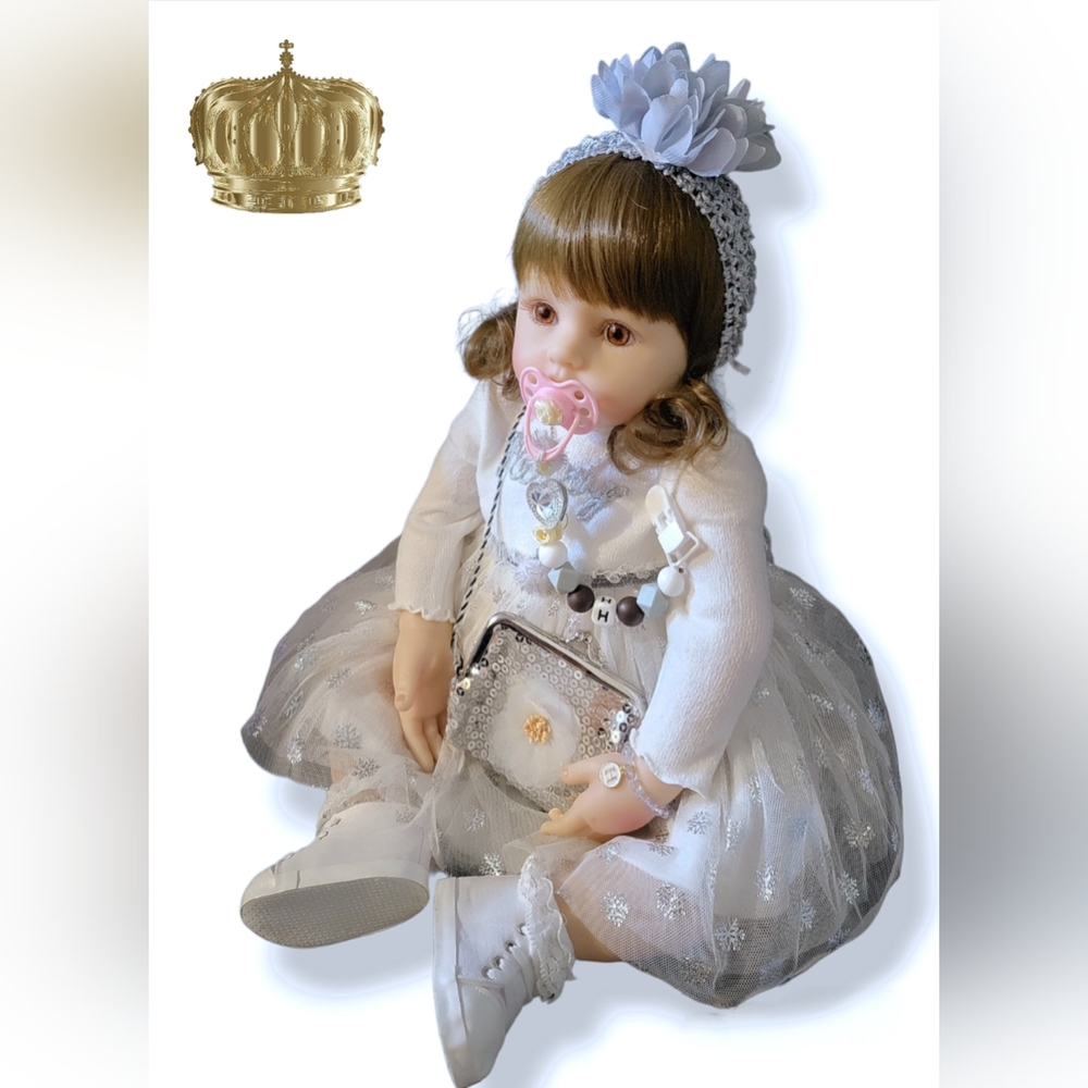 24 inch silicone vinyl doll. Iliana Collection. More than 10 luxury accessories.